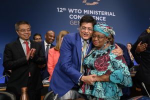 Director-General Ngozi Okonjo-Iweala is congratulated by Indian Minister of Commerce Piyush Goyal, after the closing session of the World Trade Organization Ministerial Conference at the WTO headquarters in Geneva, Switzerland.