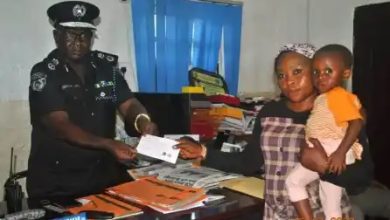 Enugu police command presenting cheques