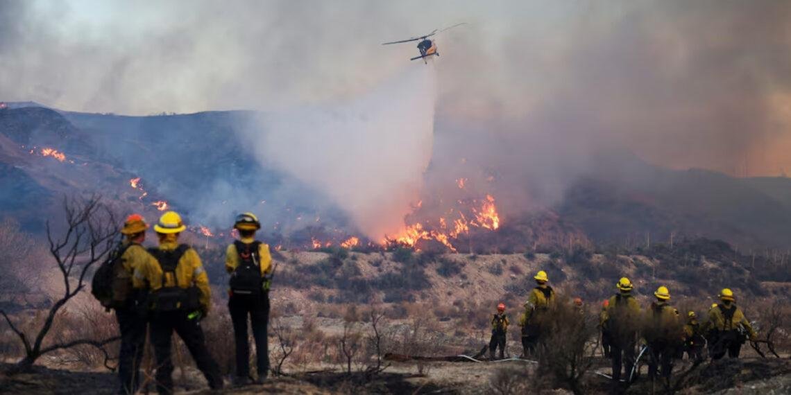 Thousands evacuated as new fast-growing fire ignites near Los Angeles
