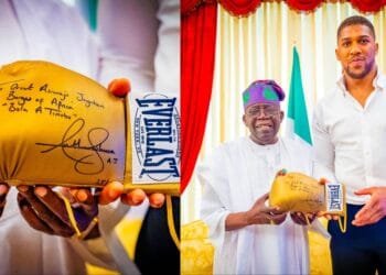 Anthony Joshua gifts Tinubu autographed glove in Lagos