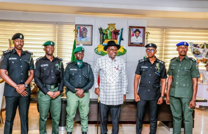 Diri decorates police officers in Bayelsa