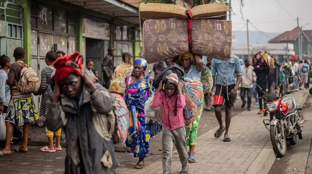 Thousands flee Congo because of rebels
