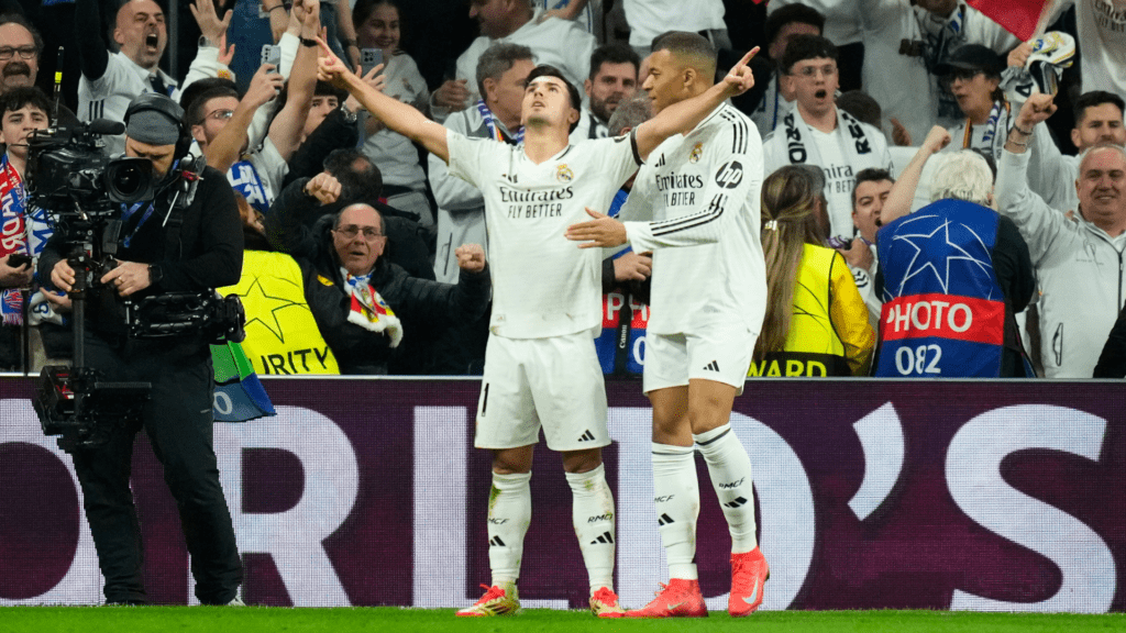 Real Madrid beat Atletico 2-1 in first leg of Champions League last 16