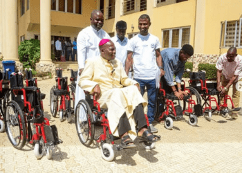 Catholic bishop donates 93 wheel chairs to persons with disabilities in Yola