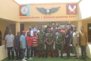 Brigadier General Timothy Opurum and Senior Officers of 1 Brigade in a group photo with Defence Correspondents at Gusau, Zamfara State