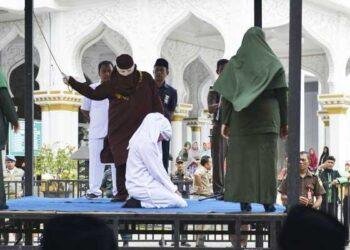 Unmarried couple publicly flogged 100 times in Indonesia's Aceh over sex outside marriage