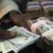 Naira appreciates to ₦1,487.89 per Dollar at official market amid CBN reforms