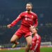 Late Szoboszlai penalty gives Salah-less Liverpool slim win over Inter