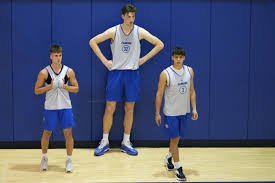 World’s tallest teen sets new college basketball record