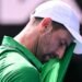 Djokovic scrapes into Australian Open semis after Musetti injury