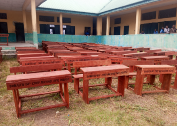 Chief Ogodo donates 120 chairs to Enhwe Comprehensive High School