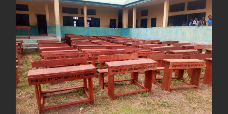 Chief Ogodo donates 120 chairs to Enhwe Comprehensive High School