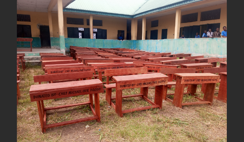 Chief Ogodo donates 120 chairs to Enhwe Comprehensive High School