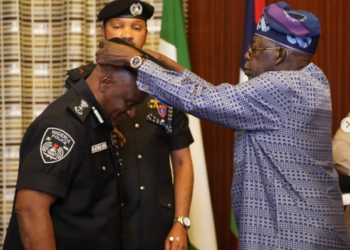 Tinubu decorates Disu as acting inspector General of Police