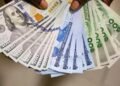 Naira trades around ₦1,355/$1 officially, weakens to ₦1,400 at parallel market