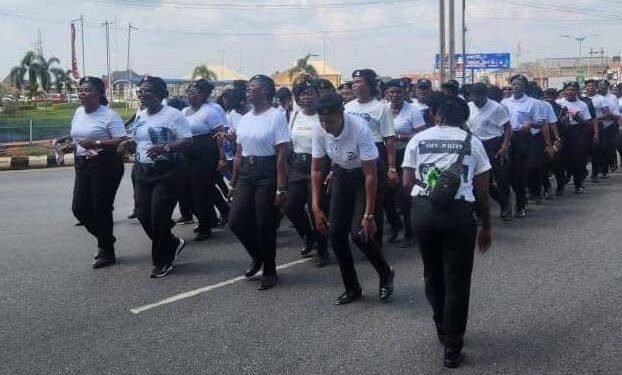 Police stage a walkathon in Delta to boost public confidence