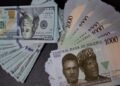 Naira firms slightly against dollar, trades near N1,344
