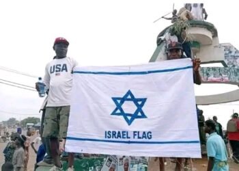 Christians in Numan mark Easter celebration waving Israeli flags