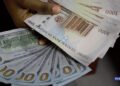 Naira trades steady against Dollar as black market rate hits ₦1,400