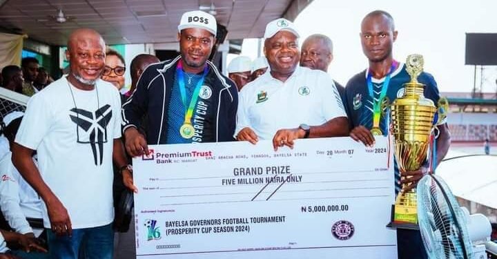 Prosperity Cup wnners receive prize money after triumph at tournament