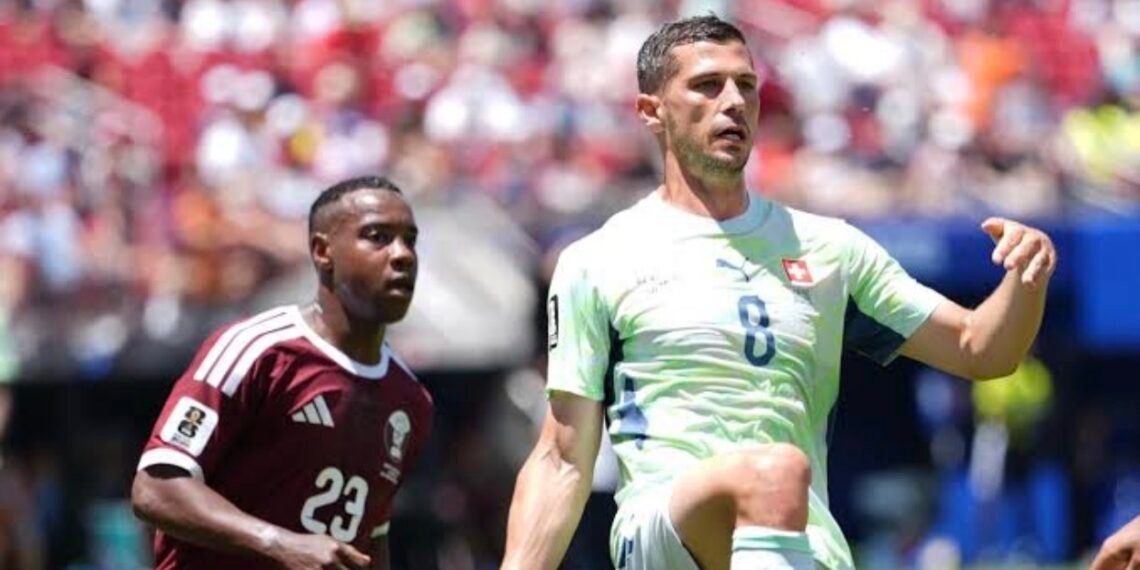 Qatar stun Switzerland with stoppage-time equaliser to claim historic first World Cup point