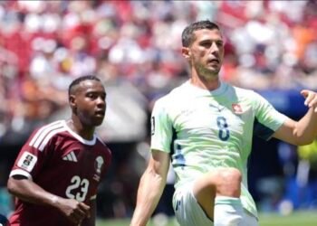 Qatar stun Switzerland with stoppage-time equaliser to claim historic first World Cup point