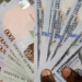 Naira remains stable as official, parallel market rates hold close range