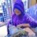 Woman Flaunting Millions In Cash To Buy iPhone 17 Air Sparks Kidnap Ransom Allegations