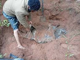 Army Uncover Shallow Grave