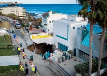 A large sinkhole has opened up outside a house in Malibu reportedly belonging to Hollywood actor Nicolas Cage.