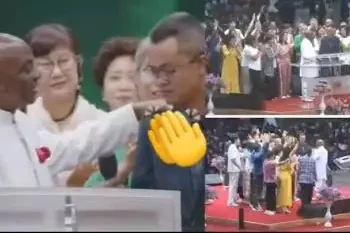 Bishop David Oyedepo lays hands on Chinese pastors during a service at Winners’ Chapel, Canaanland, Ota