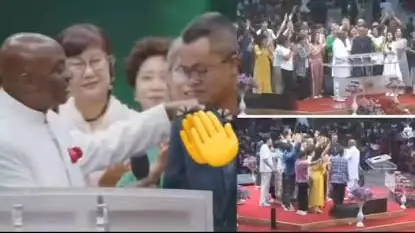 Bishop David Oyedepo lays hands on Chinese pastors during a service at Winners’ Chapel, Canaanland, Ota