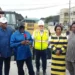 Gov. Sheriff Oborevwori speaking beside a Julius Berger representative at the failed section of the East-West Road in Agbarho